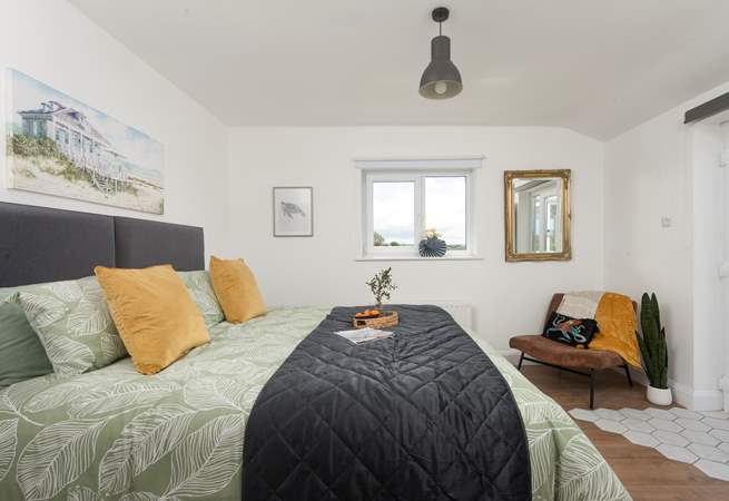 This second bedroom has double doors that opens to the terrace. 