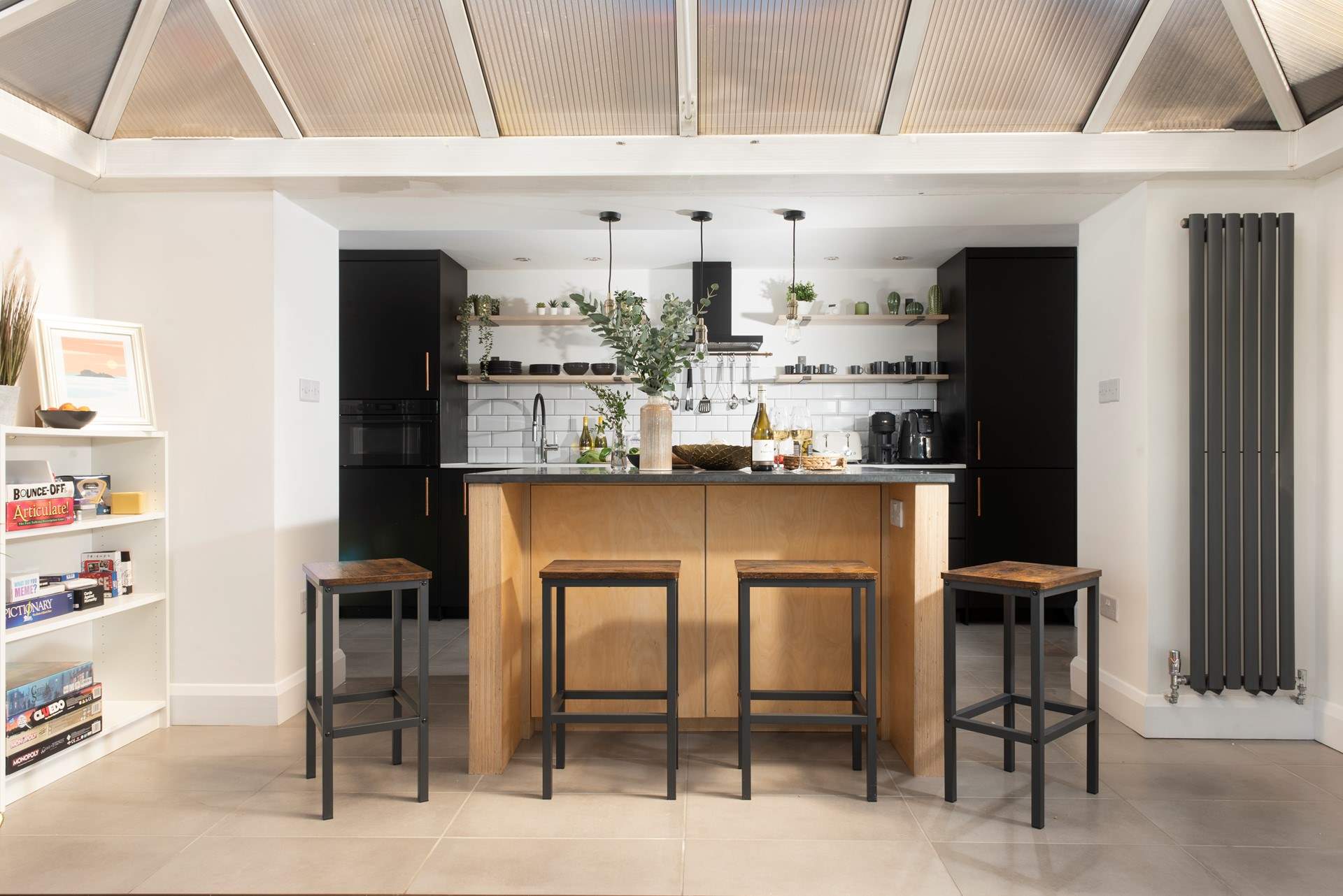 Take a pew at the island for your meals, what a sociable space. 