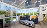 Double doors open to the patio.  - Thumbnail Image