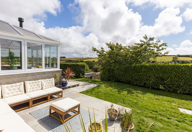 Take a walk though the gap in the hedge to enjoy exploring the shared garden beyond. 