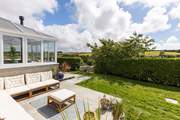 Take a walk though the gap in the hedge to enjoy exploring the shared garden beyond.