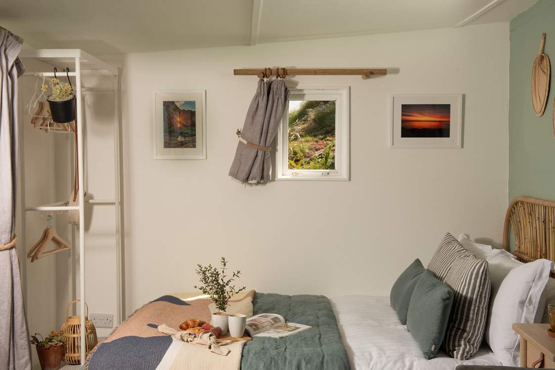 The king-sized bed offers the perfect night's sleep.