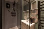 The shower-room is just the spot for refreshing sun-kissed skin.