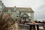 Have a bite to eat or drink in the beer garden at the local pub.