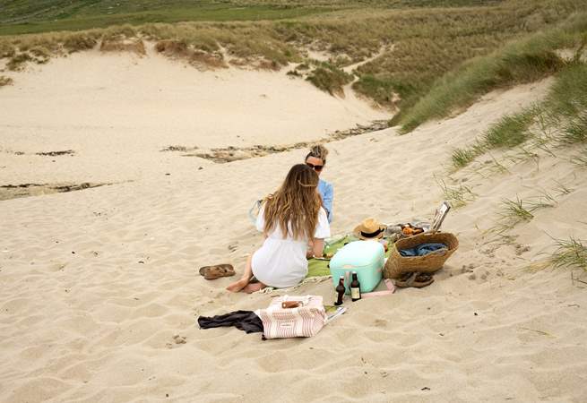 The dunes on Sennen Beach make a dreamy spot for a picnic. 