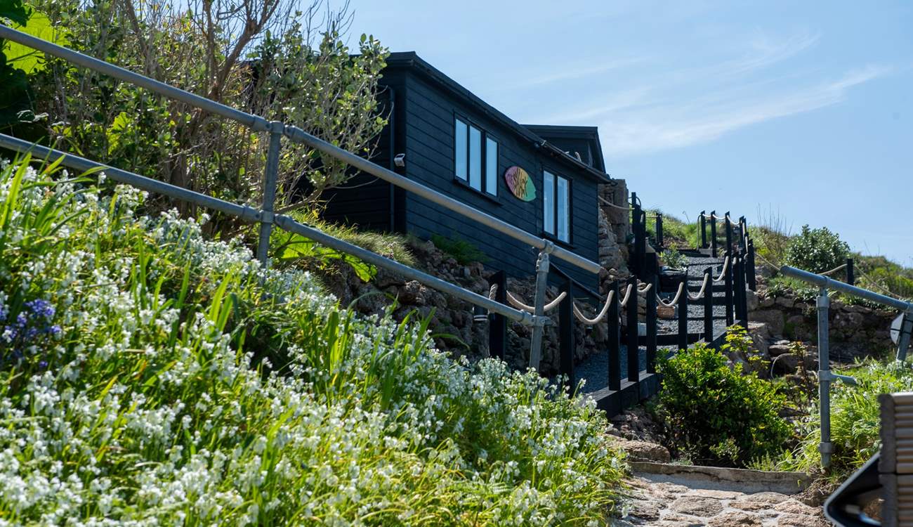 The Surf Shack is nestled into the cliffs above spellbinding Sennen. 