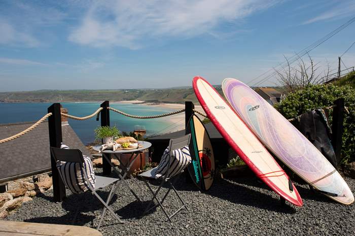 The Surf Shack is a Bespoke cabin in walking distance from the beach, with sea views in Sennen, Cornwall