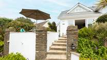 From parking up the car, you walk up through the manicured tropical garden passing the owners' house and on to Palms 1, which has been set back for your privacy. 