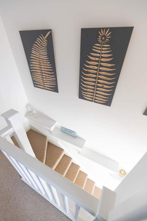 Climb the stairs and enjoy the gallery.