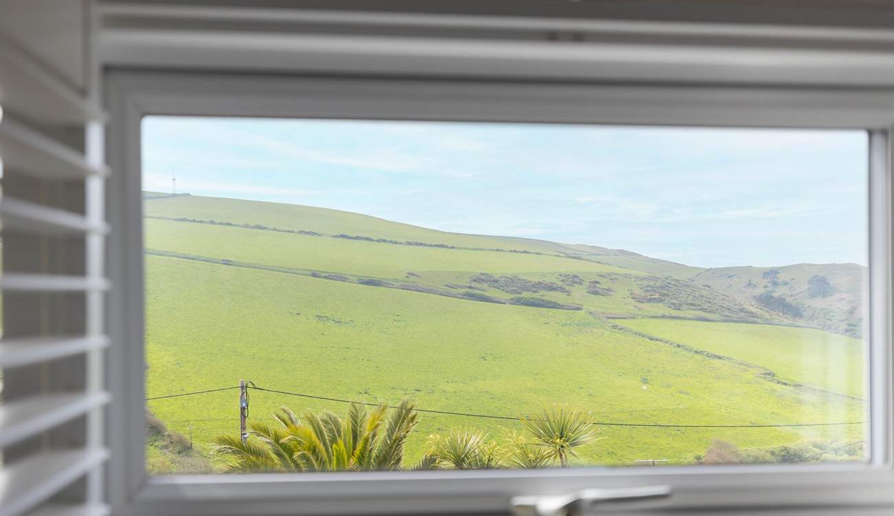 Open the shutters and take in the view, no matter the season.