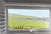 Open the shutters and take in the view, no matter the season.