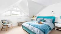 This beautiful bedroom offers sleek interiors with beautiful styling, the perfect combination for a dreamy sleep.