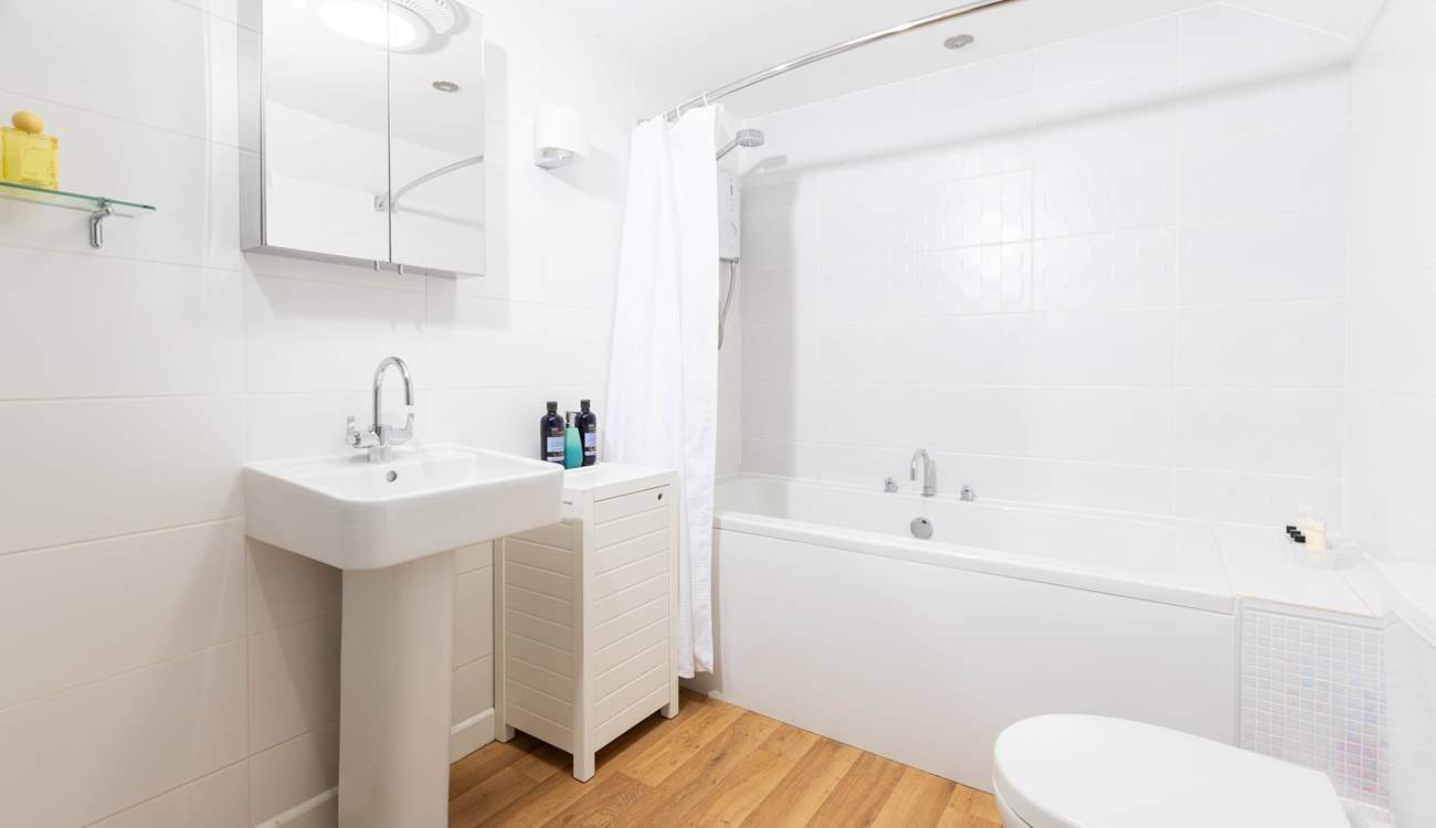 The family bathroom sits between both bedrooms on the landing. 
