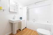 The family bathroom sits between both bedrooms on the landing.