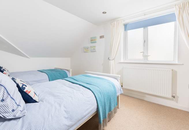 The perfectly formed twin bedroom sits to the back of the house. 