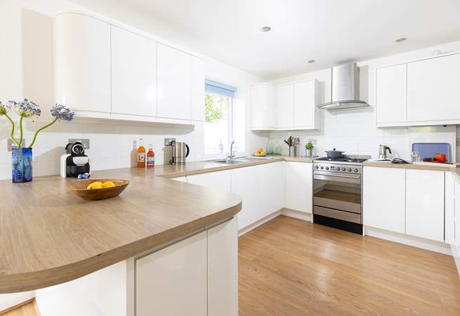 The fully equipped kitchen offers the perfect spot to cook up a feast.