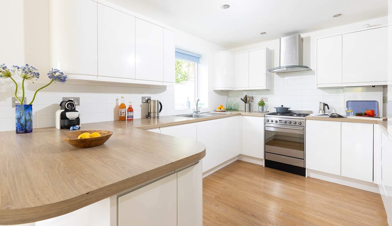 The fully equipped kitchen offers the perfect spot to cook up a feast.