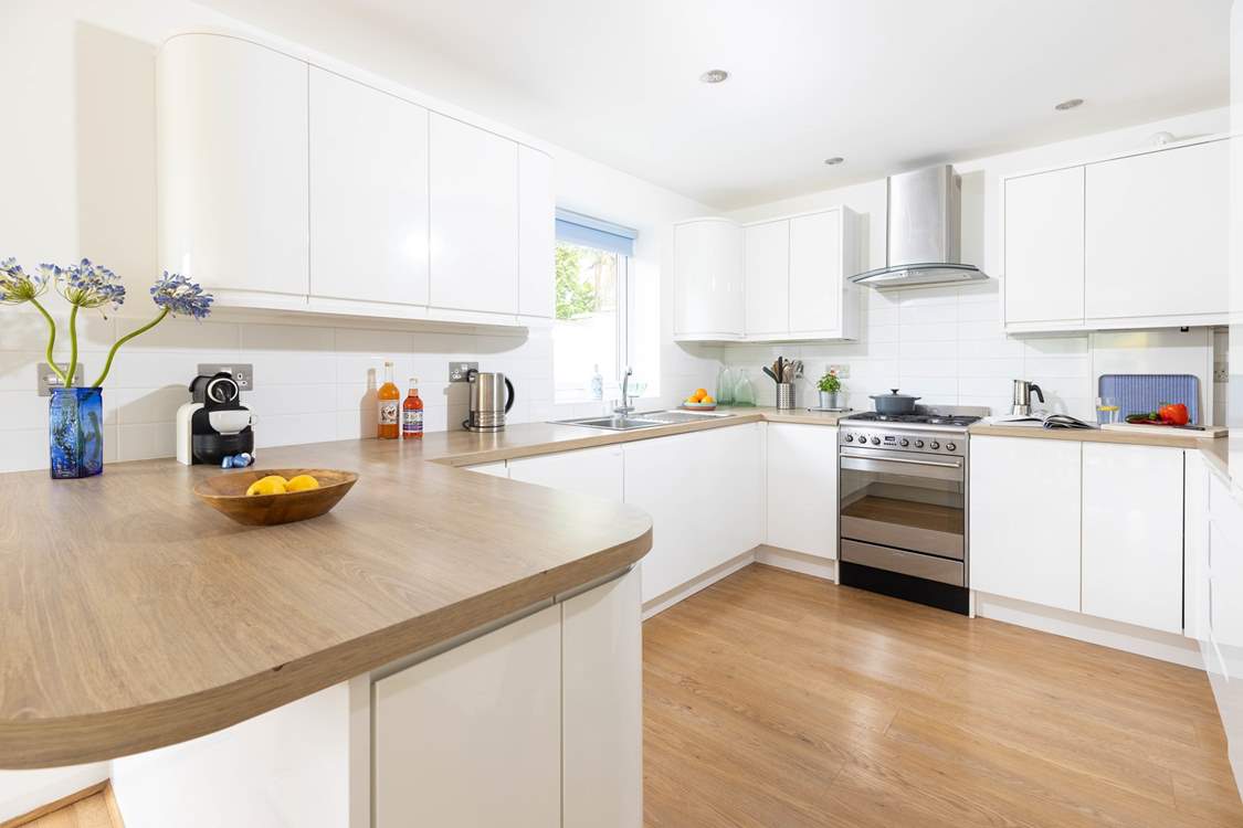 The fully equipped kitchen offers the perfect spot to cook up a feast.