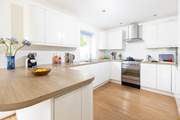 The fully equipped kitchen offers the perfect spot to cook up a feast.