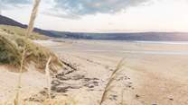 Surf the sand dunes as the sun sets and you have the beach to yourself. 