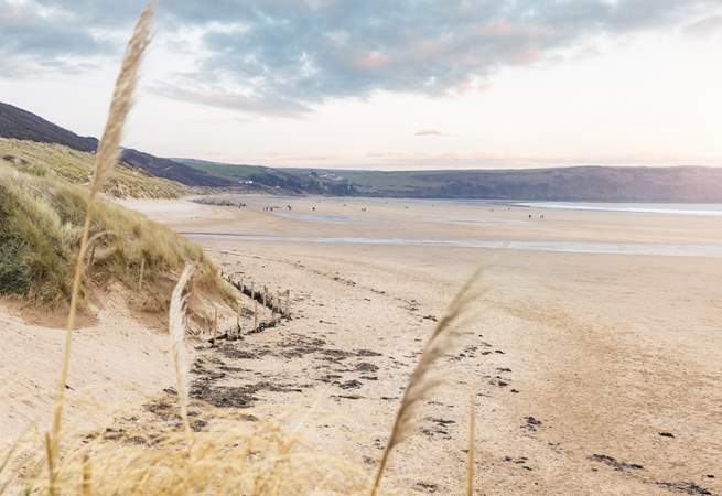 Surf the sand dunes as the sun sets and you have the beach to yourself. 