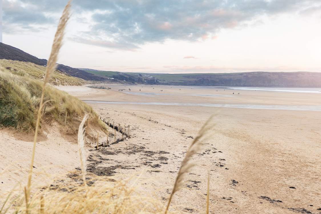 Surf the sand dunes as the sun sets and you have the beach to yourself.