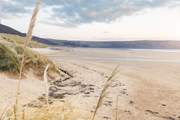 Surf the sand dunes as the sun sets and you have the beach to yourself.