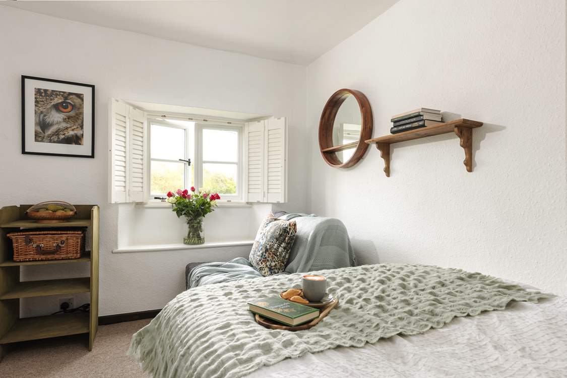 The second bedroom has a handy pull-out bed that doubles up as a comfy seat.