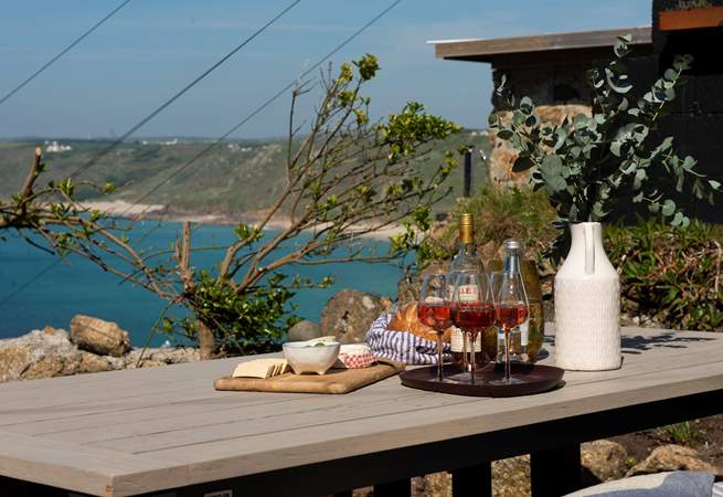 Enjoy a glass of wine al fresco with this magnificent view.