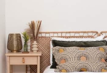 Neutral tones inside, surrounded by the blue sea outside.