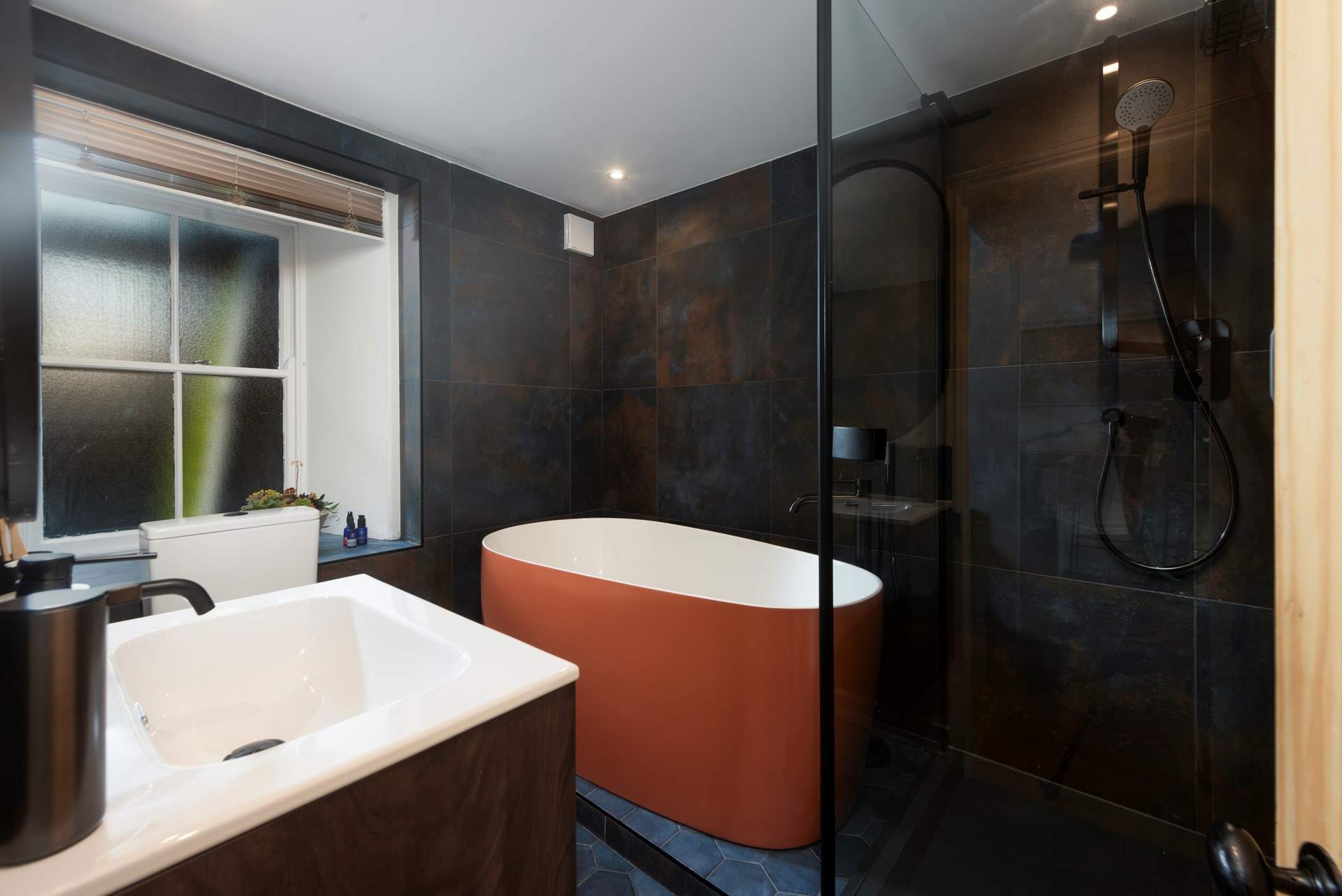 Upstairs and down, the luxury bathrooms with free-standing baths are of an exceptional standard.