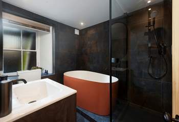 Upstairs and down, the luxury bathrooms with free-standing baths are of an exceptional standard.