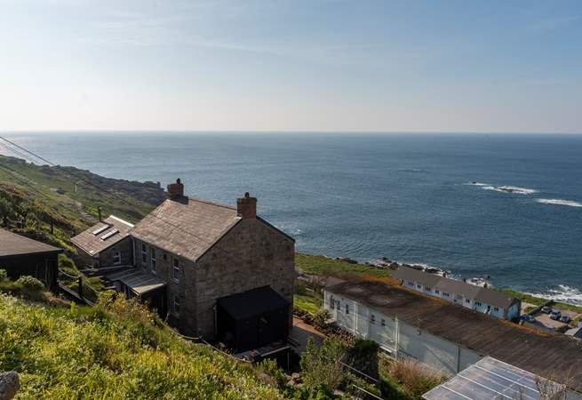 Peter's Cottage with its amazing view and access to the South West Coast Path to the left.