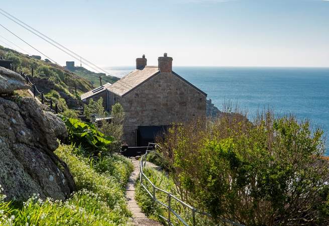 Peter's Cottage is accessed by 18 steps, hold the handrail it is steep, as the views will distract you!