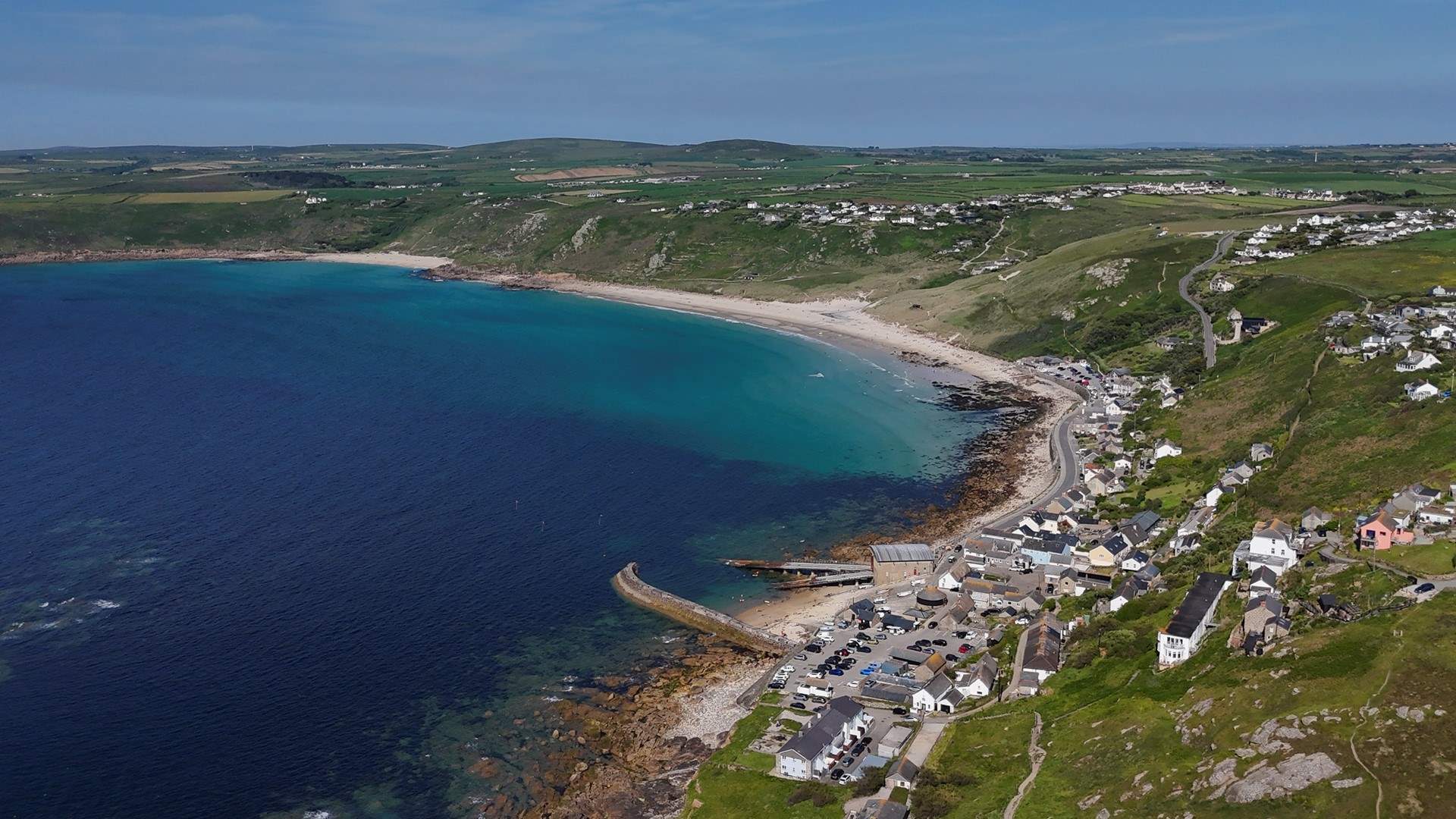 Looking over Sennen across the azure blue sea. 
