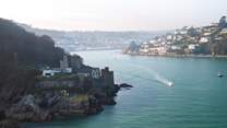 Picture-perfect Dartmouth and Kingswear. You can cross between the two using the little ferry, or why not try the Round Robin, a day out via bus, river cruise and steam train!