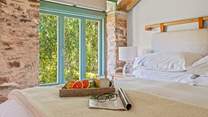 Welcome to bedroom 3. Home to a super inviting king-size bed.