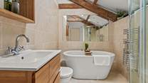 The family bathroom is just across the hallway from bedroom 3. 