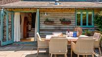 Step outside of the cottage into this beautiful patio-area.