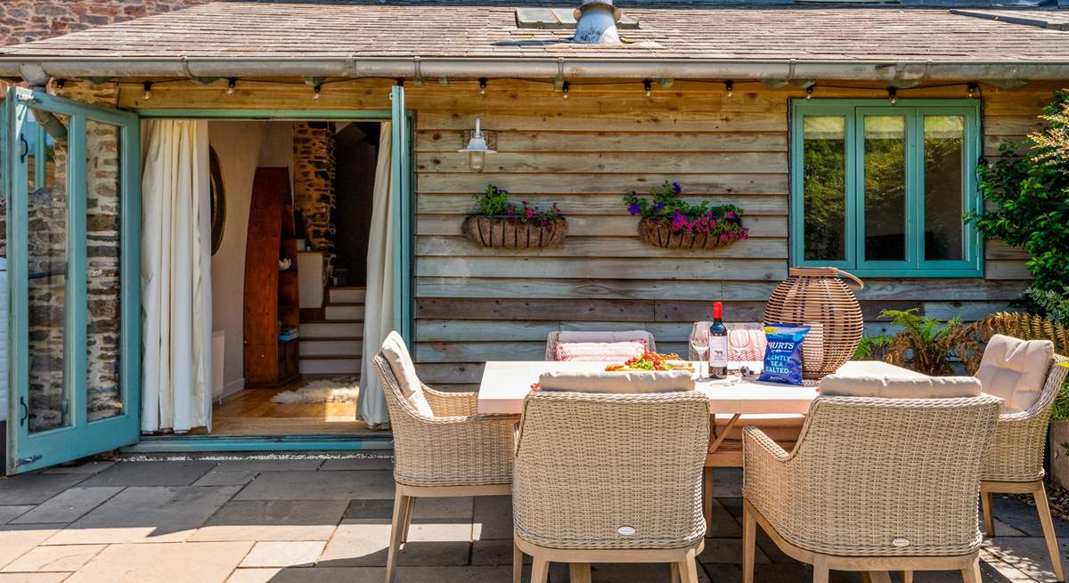 Step outside of the cottage into this beautiful patio-area.