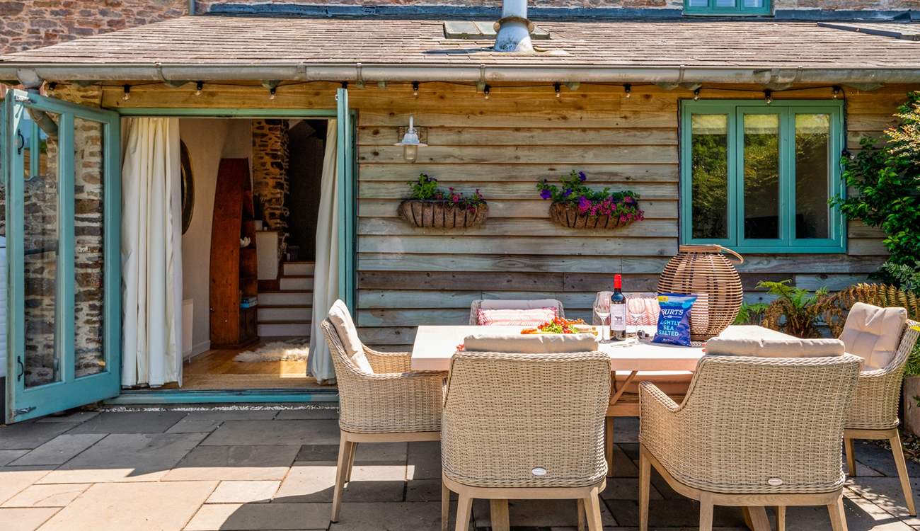 Step outside of the cottage into this beautiful patio-area.