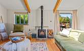 This fabulous living area is complemented by a fabulous wood-burner. - Thumbnail Image