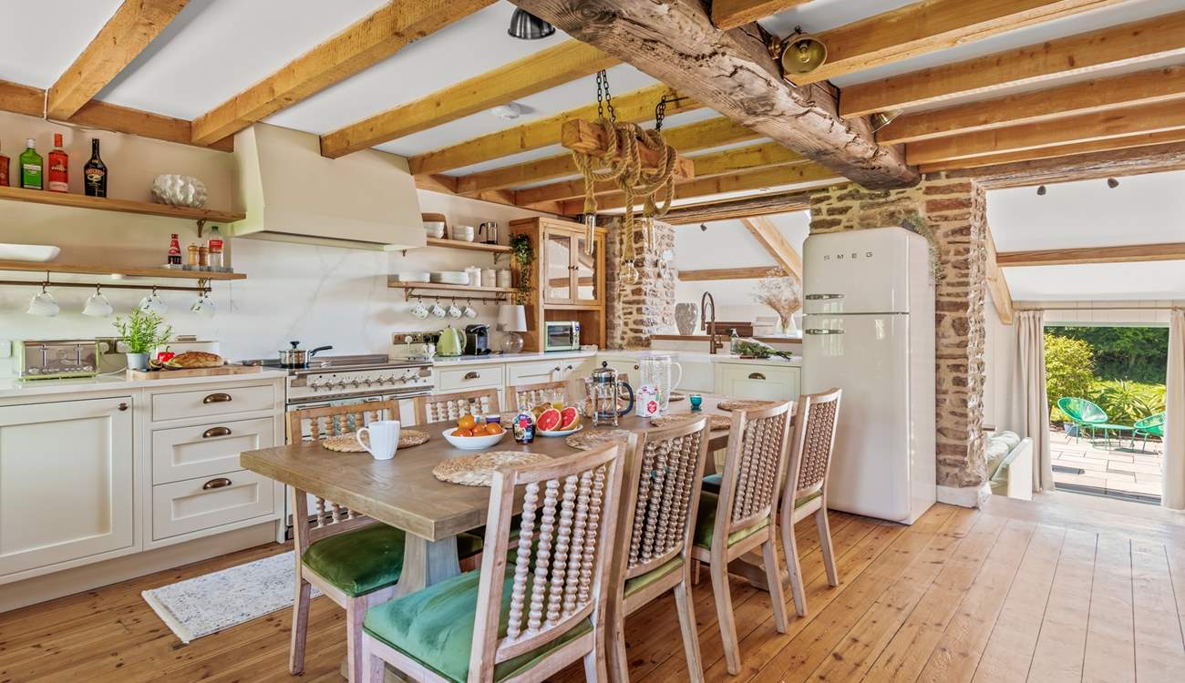 What a fabulous space to enjoy preparing, serving and dining in.