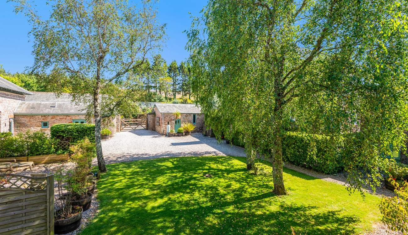 Peeking back at the entrance gate from your stable doors.