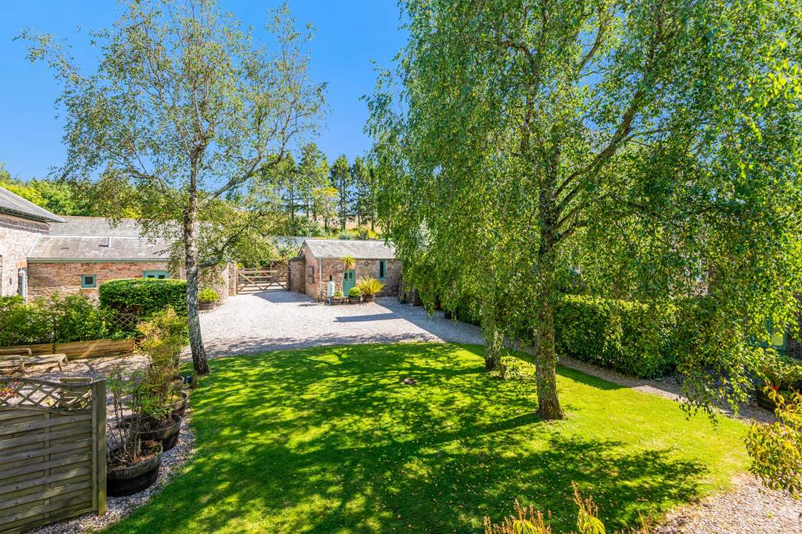Peeking back at the entrance gate from your stable doors.