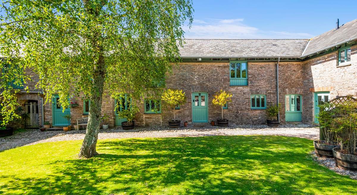 Camellia Cottage is nestled in this picture perfect courtyard.