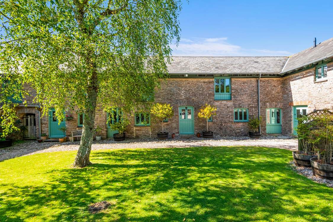 Camellia Cottage is nestled in this picture perfect courtyard.