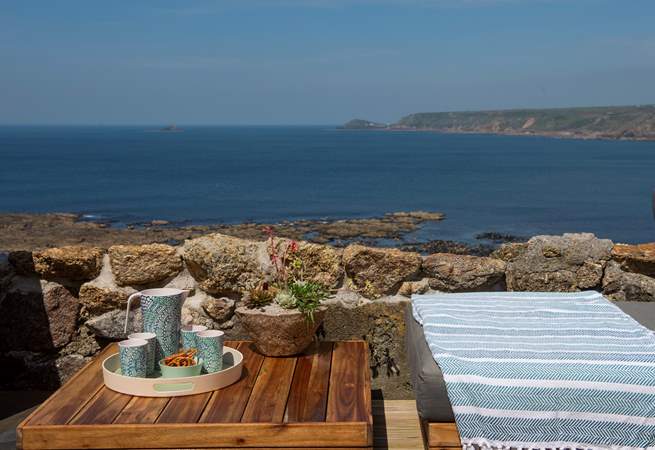 You can never tire of the views at this gorgeous cottage, take care there is a small drop on the other side of the low wall.
