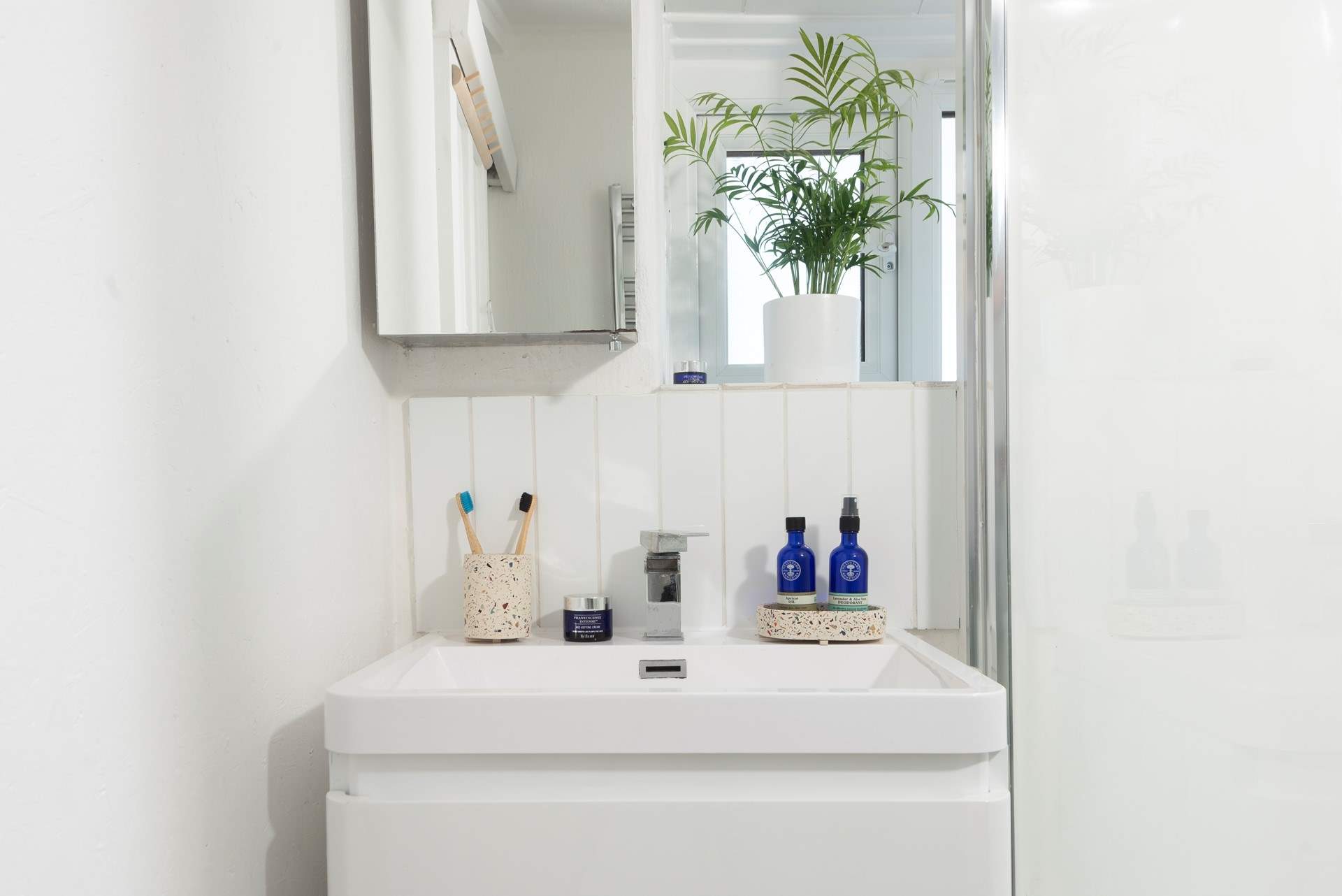 A modern bathroom to wash away the sea salty day.