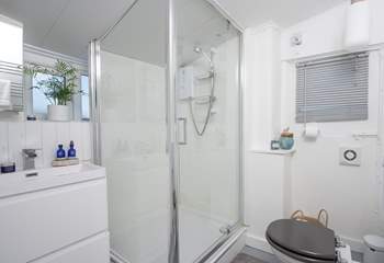 Please note the shower height is low in the bathroom.